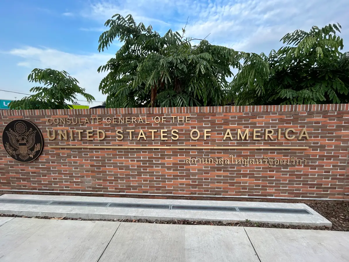 Brick wall with the words Consulate General of the United States of America and the seal
