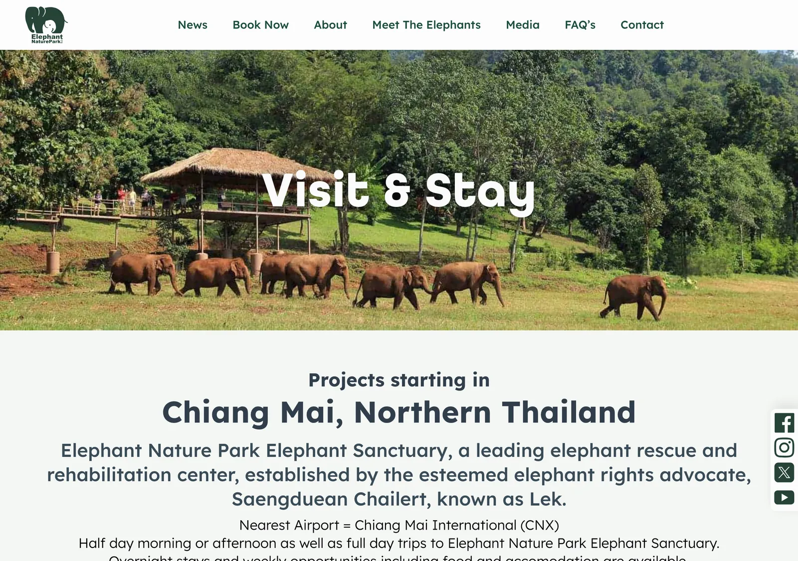 Elephant Nature Park website header showing a herd of elephants crossing a field below a viewing platform, with the heading Visit and Stay.
